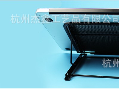 笔记本携带方便.角度灵活调动..通风